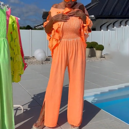 👗Cutout Top & Bandeau Jumpsuit – Bold cutouts & sleek bandeau – Turn heads wherever you go.